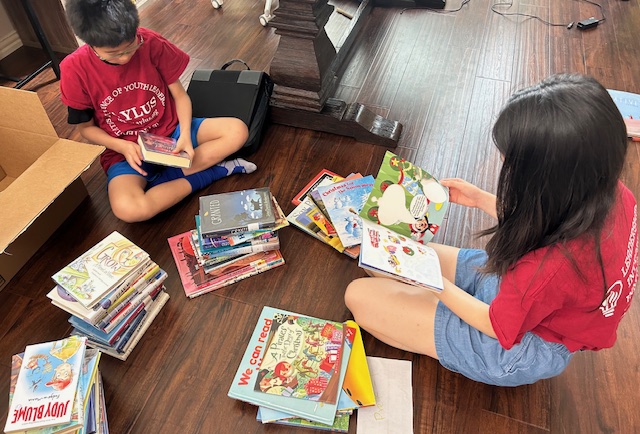 Sorting 1000+ donated K-6 books for 4th African Library Project on April 20th&nbsp;2024