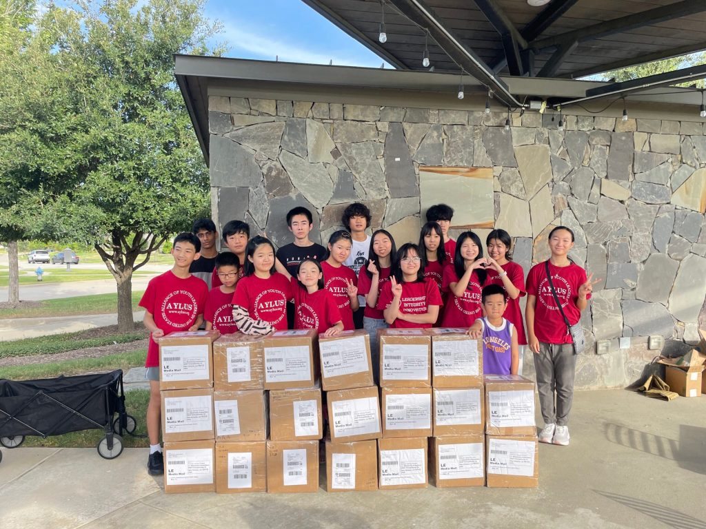 Packaging 1000+ Prek-8 books for 6th African Library Lesotho Library on August 17th&nbsp;2024